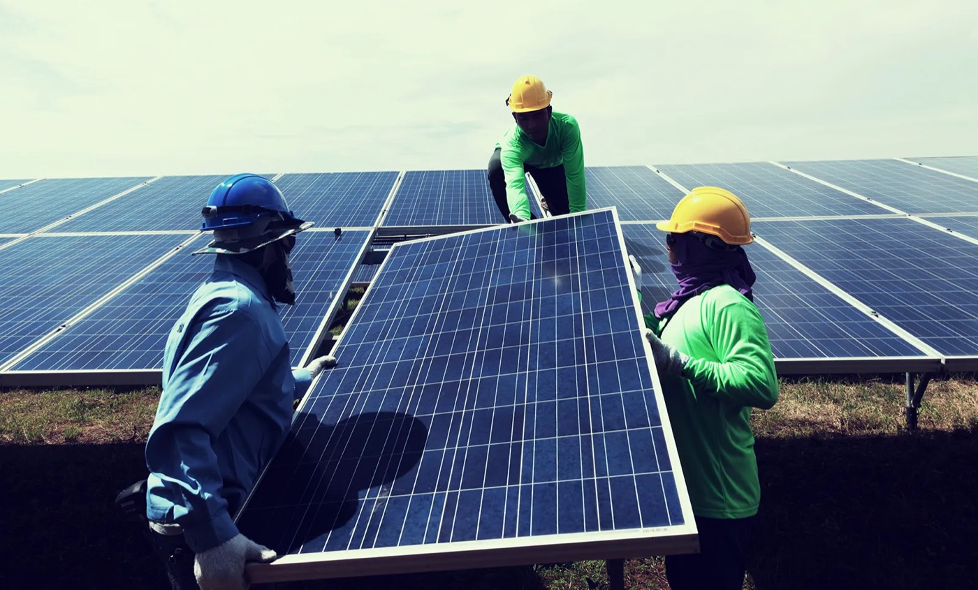 Installers mounting solar panels