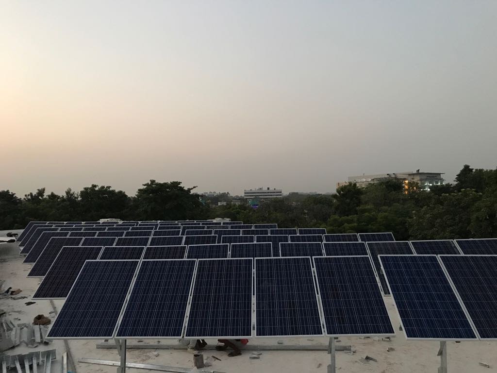 Rooftop solar array at dusk
